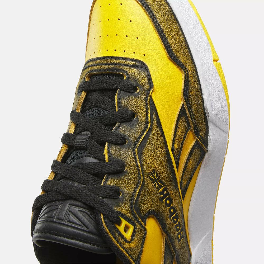 Reebok black yellow shoes hotsell